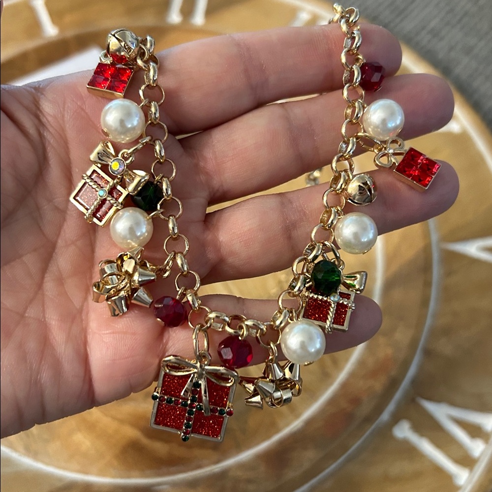 Avon Pearly Wrapped Necklace NEW dangling Christmas charms